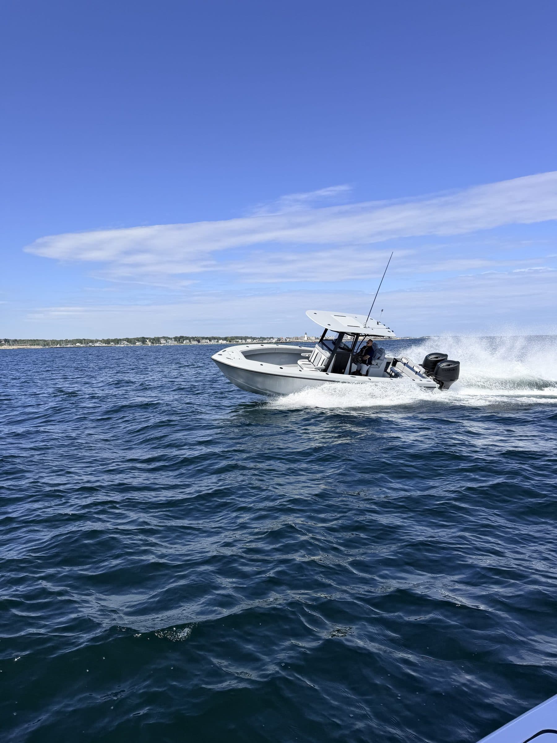 A center console running wide across open water